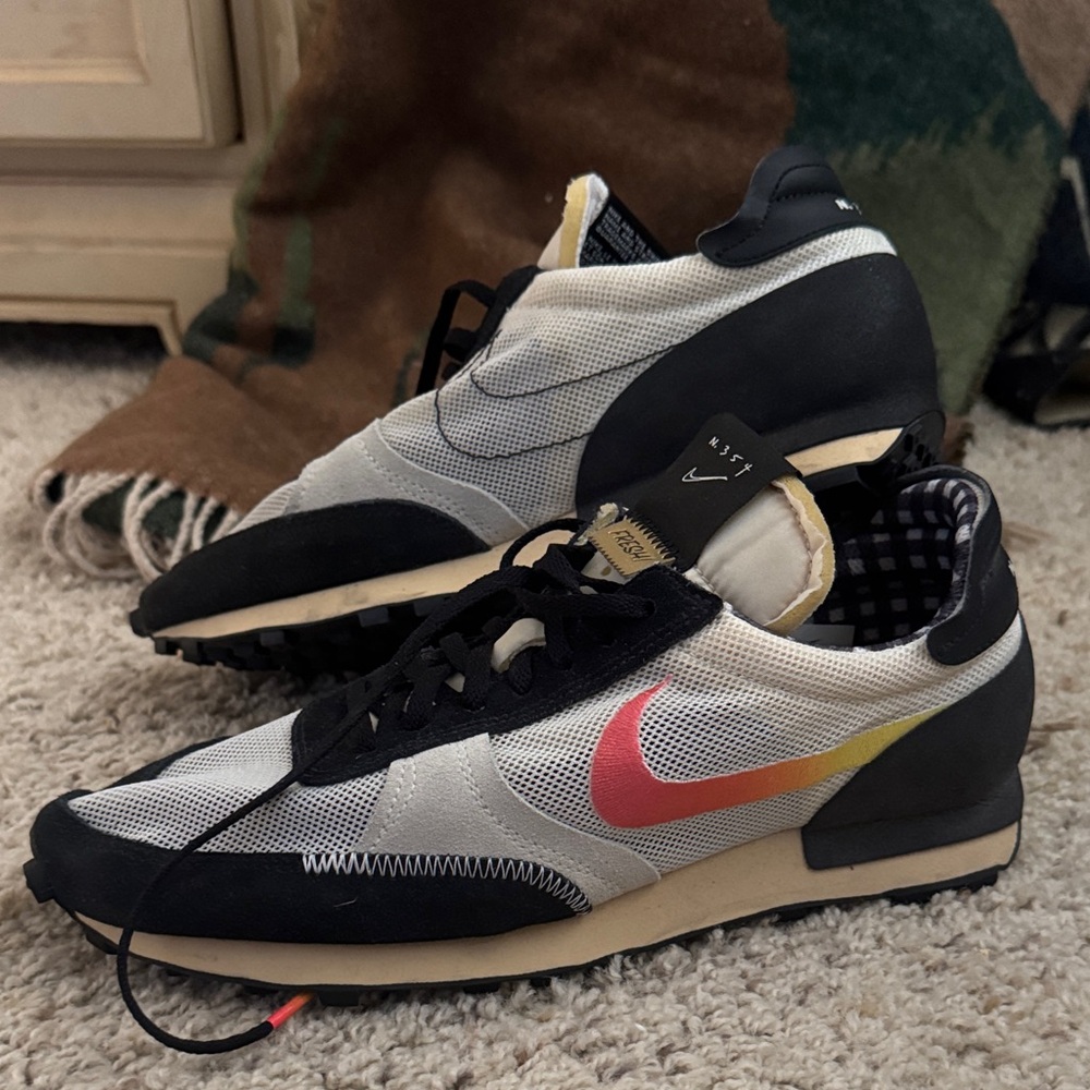 Nike Black and White Shoes with Pink and Yellow Swoosh